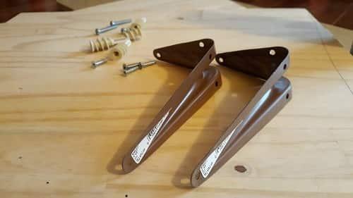 screws-wood-and-l-brackets-SW Screws, wood, and shelf brackets laid out for DIY cat shelves.