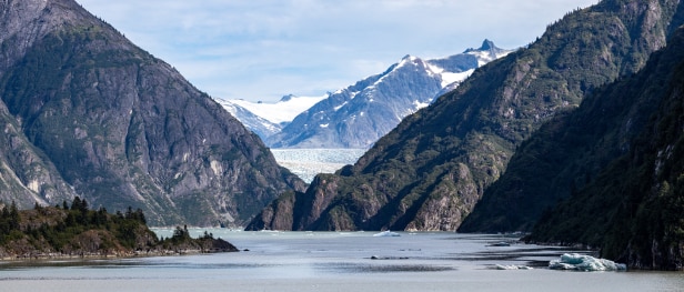 A scenic view of mountains and a lake
